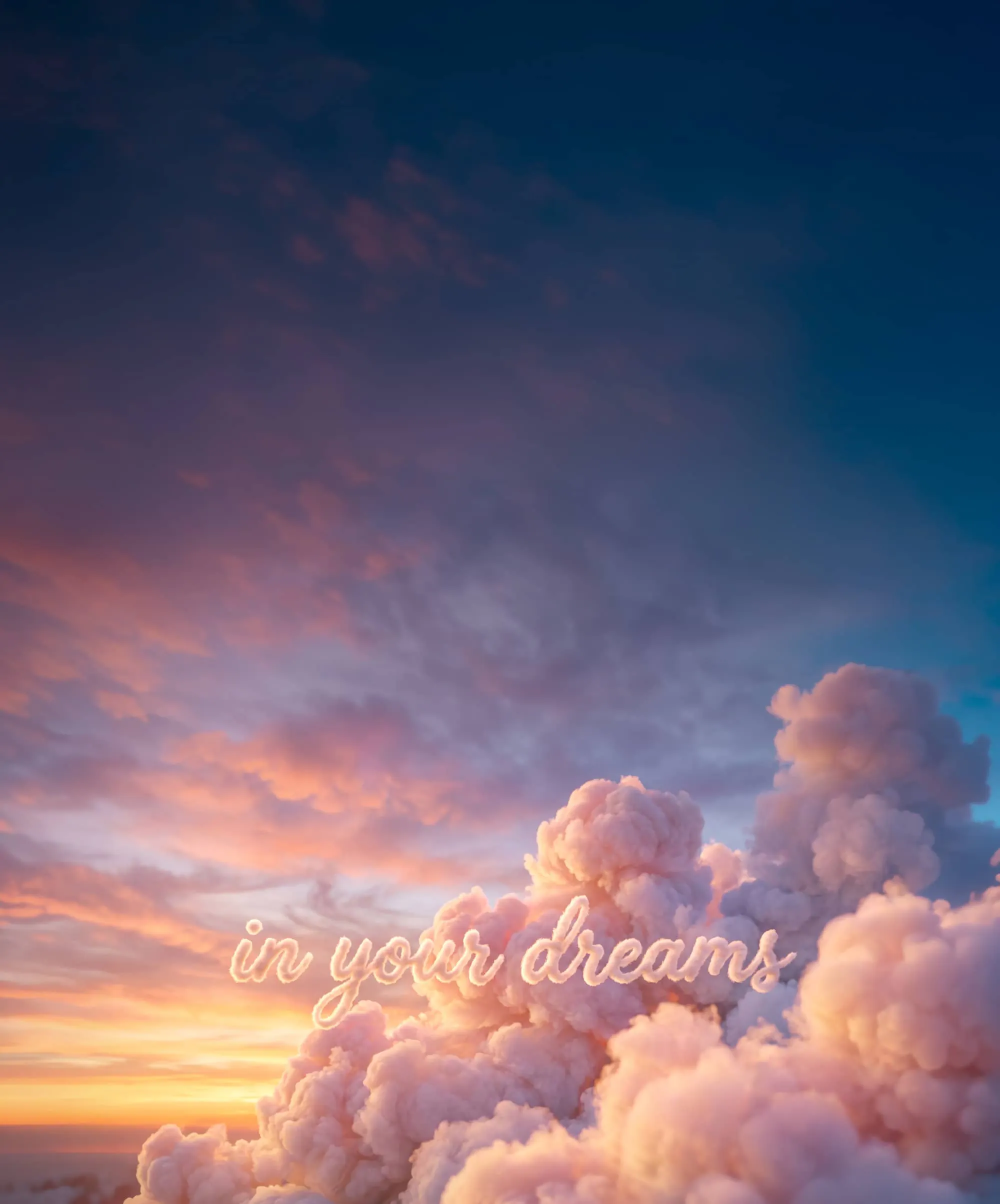 A dreamy scene of sunset tinted clouds with the phrase 'in your dreams' written out in the clouds