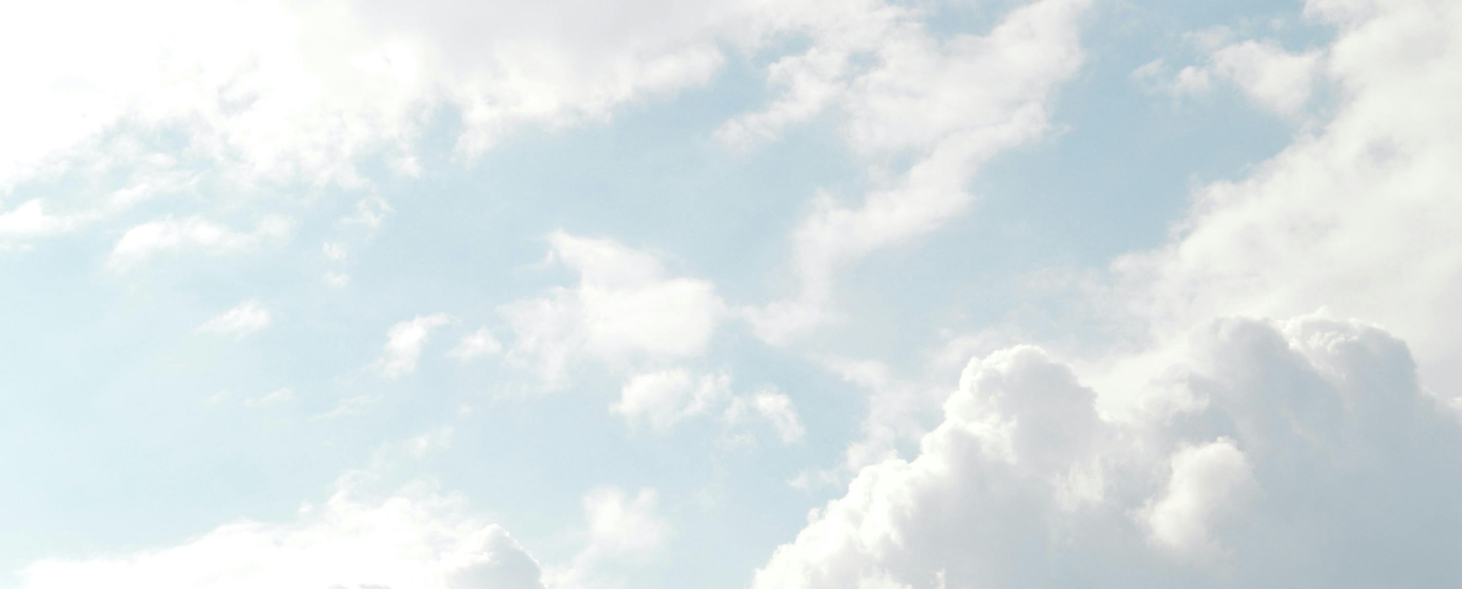 fluffy sky blue clouds