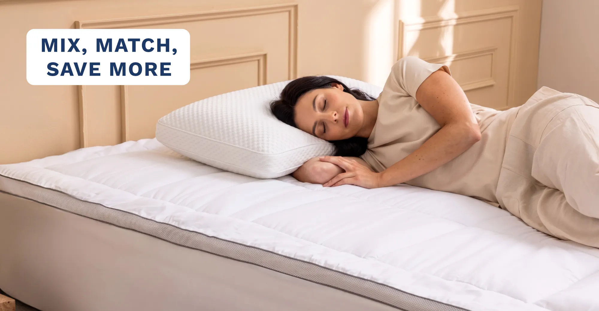Mix, Match, Save More. An image of a woman sleeping on a plush pillow top mattress topper with a thick memory foam pillow underneath her head.