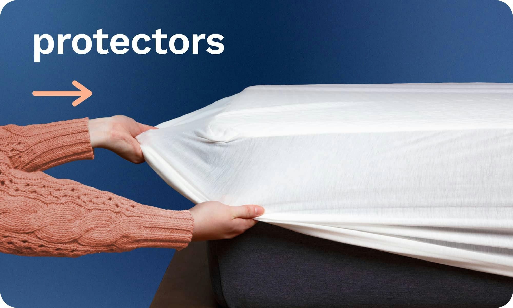 Mattress Protectors; A person pulling the elastic skirt of a white mattress protector over the corner of a mattress