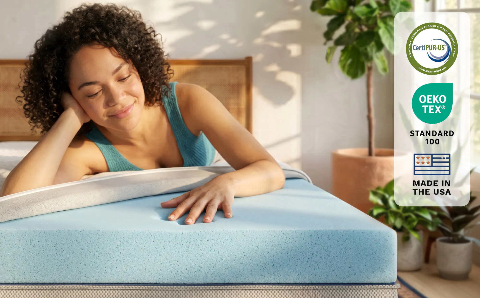 A couple replacing the comfort layer of their mattress